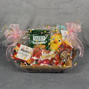 gourmet gift basket with yellow bunny duck plush and treats