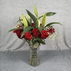 red roses white lilies bouquet with baby's breath and vase