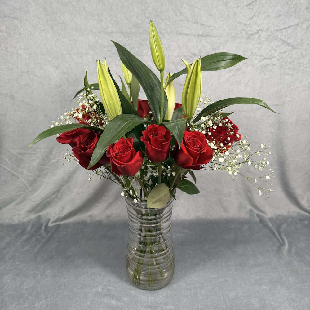 red roses white lilies bouquet with baby's breath and vase