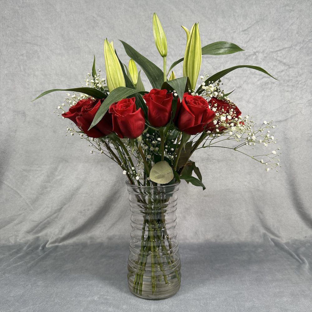 red roses white lilies bouquet with baby's breath and vase